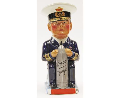 A Wilkinson WWI toby jug of Admiral Beatty, designed by Sir Francis Carruthers Gould, modelled seated holding a 'Dread Nought