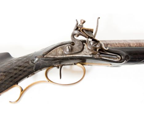 A 39" barrel typically Germanic style flintlock hunting rifle of about 25 bore, it has a beautiful damascus barrel and nicely