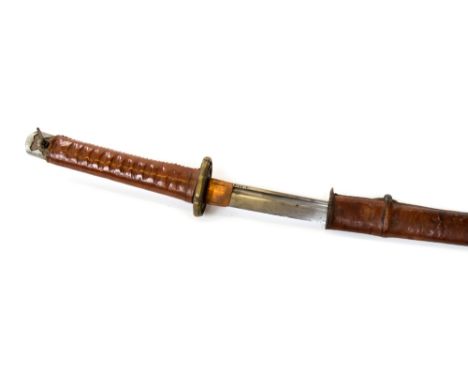 An arsenal made katana, 68cm fullered blade No.6306 and stamped to the South Arsenal, pierced plain brass tsuba, hilt re-cove