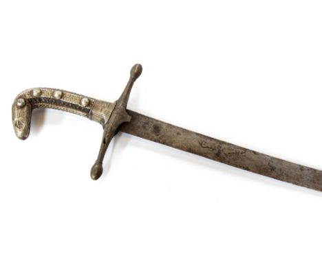 A sabre in the Shamshir style, possibly Indian, 80cm curved blade with silver decorated hilt, no scabbard