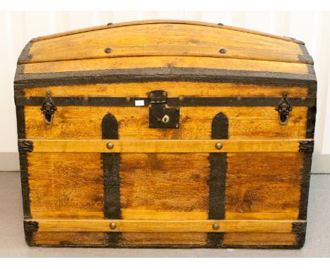 A domed top wooden shipping trunk, width 90cm 