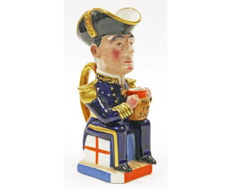 A WWI Wilkinson toby jug depicting Admiral Jellico, designed by Sir Francis Carruthers Gould, modelled seated holing a jug ti