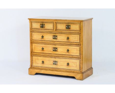 Maple &amp; Co. Gothic Revival painted ash chest of drawers, circa 1870, with painted crossbanding and simulated inlays, havi