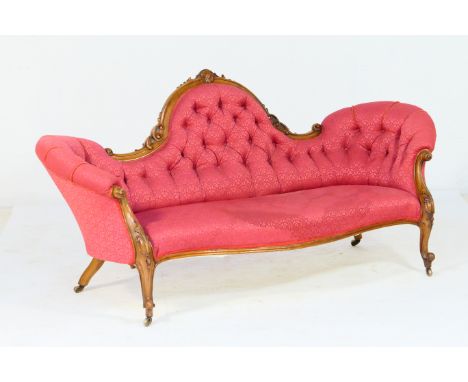 Victorian walnut and upholstered double spoon back settee, circa 1850-70, the central arched back upholstered in deep buttone