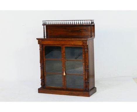 Good George IV rosewood chiffonier, circa 1825, the back with a bobbin turned rail and single shelf supported on carved, reed