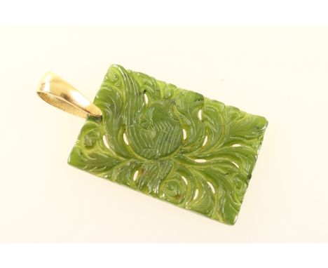Carved nephrite jade pendant, rectangular form carved with a bird, suspended beneath a 9ct gold hallmarked loop, the jade 45m