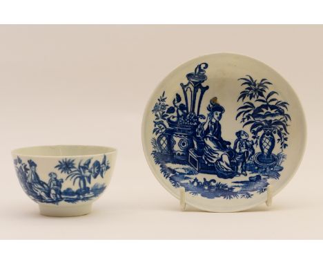Worcester blue and white printed tea bowl and saucer, circa 1780, decorated with a mother and child pattern in underglaze blu