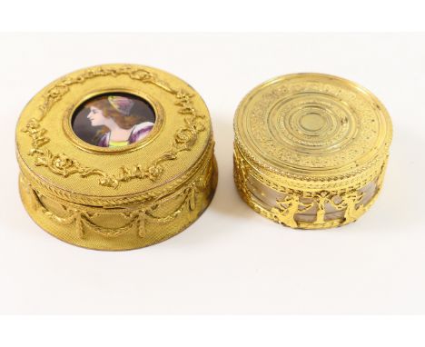 French ormolu ring box, late 19th Century, circular form, the hinged cover inset with a Limoges enamelled roundel featuring a