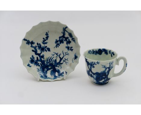 Worcester porcelain coffee cup and saucer, circa 1770, fluted design painted with prunus root pattern in underglaze blue, pai