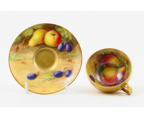 Royal Worcester cabinet cup and saucer, circa 1926, hand decorated with fruits by F Harper, and with a gilded exterior, print