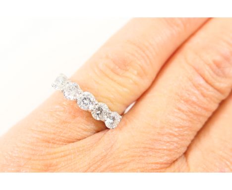 Diamond five stone ring, set in platinum, having well matched stones, each of approx. 0.25ct, brilliant cut and estimated as 