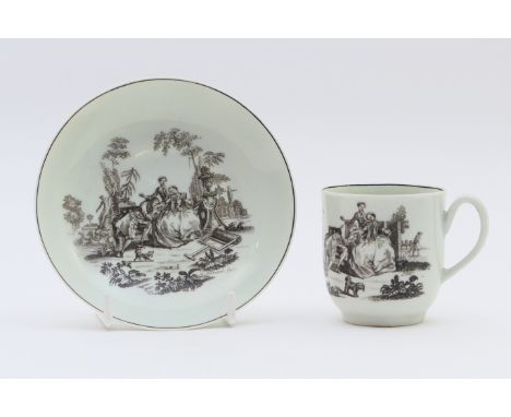 Worcester porcelain coffee cup and saucer, circa 1780, decorated with a monochrome print 'Les Amoureuses' after Hancock, the 