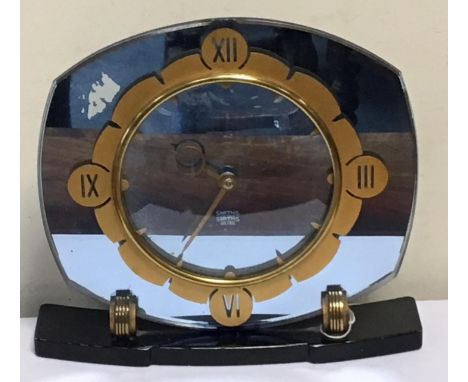 Art Deco Smiths 'Sectric' mantel clock, blue tinted mirrored dial with gilded chapter ring, English movement, raised on a bla