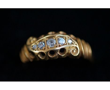 18ct gold ring set with 5 diamonds Size K