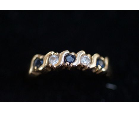 9ct gold ring set with sapphire, half eternity ring size R