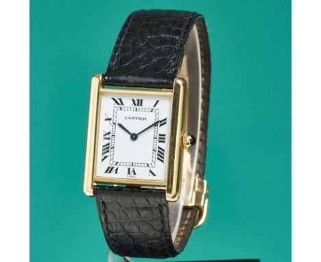 CARTIER - ArmbanduhrFa. Cartier, Schweiz. Modell: Tank Louis Cartier. 750/- Gelbgold, gestemp. Gew.: 35,4 g. Saphir. Ref.-Nr.