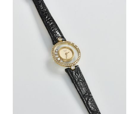 Chopard-Damenarmbanduhr mit DiamantlünetteFa. Chopard, Genève. Modell: "Chopard Happy Diamonds". 750/- Gelbgold. Gewicht: 15,