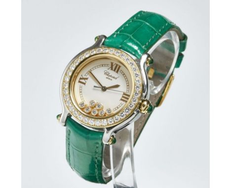 Chopard-DamenarmbanduhrFa. Chopard, Genève. Modell: "Happy Sport". Edelstahl und 750/- Gelbgold. Gewicht: 45,6 g. 7 beweglich