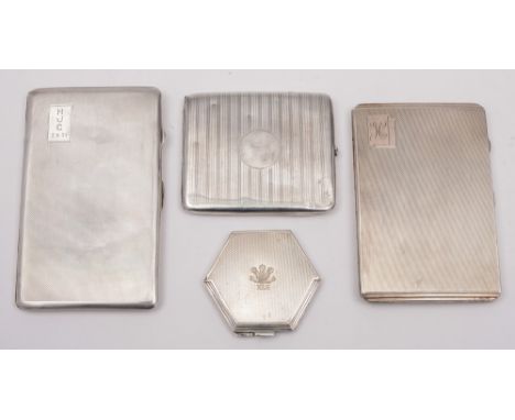 Three silver engine turned cigarette cases: and a hexagonal powder compact, total weight of silver 16.54ozs.