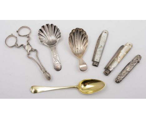 Three silver and silver and mother of pearl fruit knives:, a Georgian silver gilt teaspoon, a Georgian silver bright cut shel