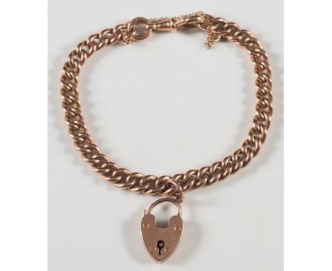 A 9ct gold curb-link bracelet: with padlock clasp and safety chain, approximately 28gms gross weight. 