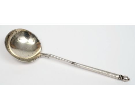 An imperial Russian silver spoon, maker R.M.: of traditional design, the circular bowl on slender stem with ball finial, 20cm