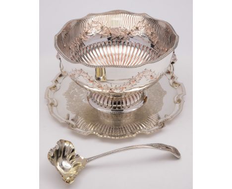 A large plated punch bowl: with gadrooned rim, garland decorated sides with lion mask ring handles, on a circular foot, 32cm.