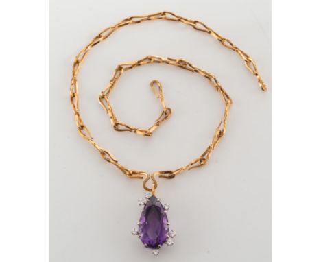 An amethyst and diamond pendant on chain: with tear-drop amethyst approximately 23mm long x 13mm wide in a gallery claw setti