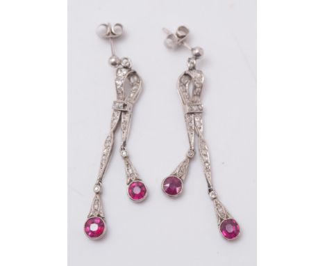 A pair of 20th century ruby and diamond drop earrings: each suspending two circular rubies and mille-grain set with circular-