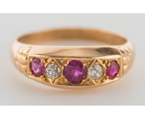 An Edwardian 18ct gold, ruby and diamond five-stone ring:.