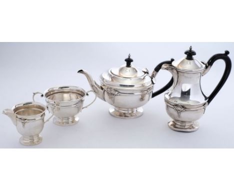 A George V silver  four-piece tea service, maker Mason & Jones, Birmingham, 1932/ 33: of plain circular form with foliate dec