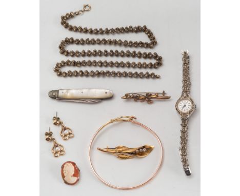A parcel of various jewellery to include a gold paste-set brooch, a silver gilt bangle and a lady's marcasite wristwatch:. 