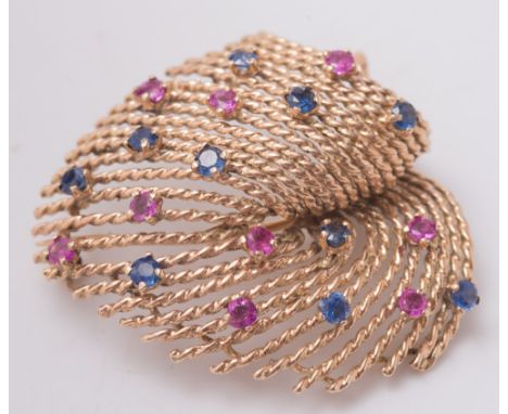 A 9ct gold, sapphire and ruby mounted 'feather' brooch:, 16.5gms gross weight.