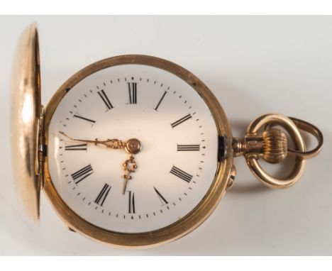 A lady's 14ct gold cased fob watch: with engine turned decoration. 
