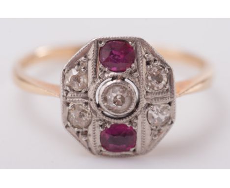 A gold, ruby and diamond hexagonal cluster ring:, ring size P 1/2. 