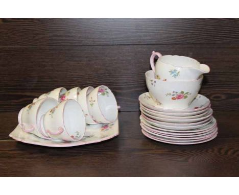 PINK FLORAL SHELLEY TEA SET
six cups, saucers and side plates with sugar, cream and cake tray
Note: Good condition