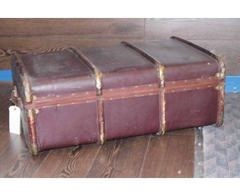 CANVAS AND BRASS MOUNTED STEAM TRUNK
with leather handles, 84cm long