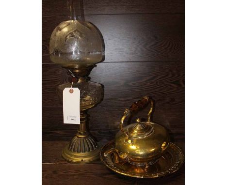 YOUNGS SPECIAL OIL LAMP
with cut crystal oil bowl, cut glass shade 60cm high; together with a brass kettle with amber glass h