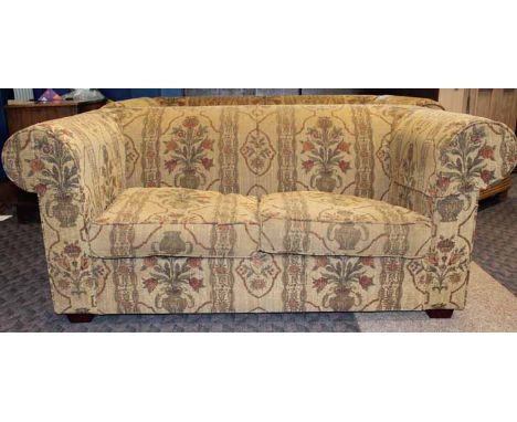 THREE SEATER SOFA AND A TWO SEATER SOFA 
with green upholstery decorated with flowers