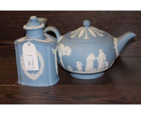 GOOD LOT OF WEDGWOOD BLUE AND WHITE JASPERWARE
including a shouldered jar and cover, a teapot and a candlestick, each decorat