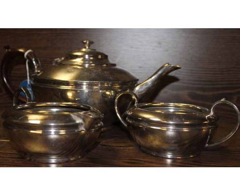 SILVER PLATED THREE PIECE TEA SERVICE
comprising a teapot, sugar and cream, of squat circular form, 28.5cm long
With surface 