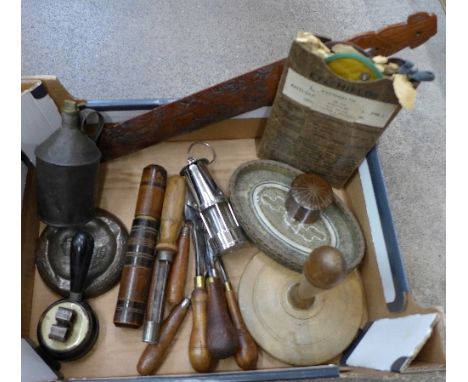 A page turner, tools, miniature miners lamp, eye shields, etc.