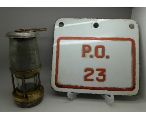 A G.P.O The Wolf Safety Lamp and a P.O. enamel sign