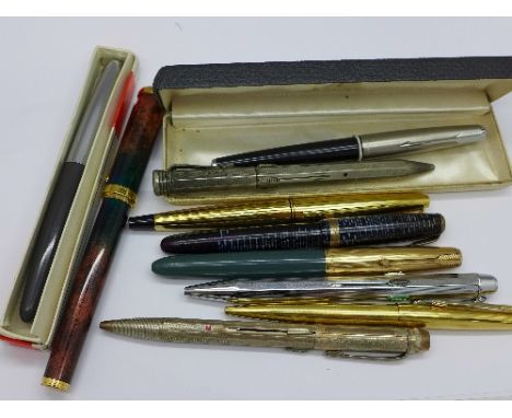 A Parker pen with 14k gold nib, boxed, a Crest pen, boxed and eight other pens and pencils