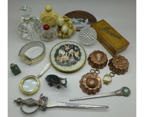 Assorted items including scent bottles, a Timex watch, etc.