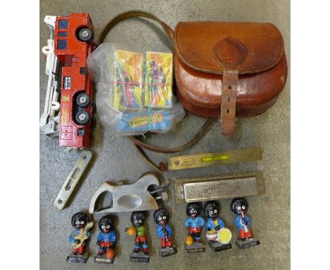 Seven Robertson advertising figures, a harmonica, a small wood plane, two levels, five Matchbox Superfast vehicles, an ERF Ma