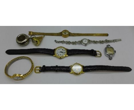 Lady's wristwatches including Sekonda, Timex and Estyma, a Buler pendant watch and a sovereign holder