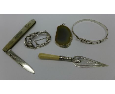 Silver items including a bangle, penknife with mother of pearl handle, bookmark, agate pendant and a brooch