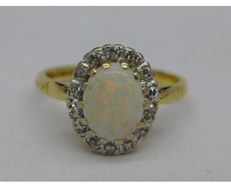 An 18ct gold, opal and diamond ring, 4.5g, P