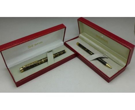 A Sheaffer fountain pen with 14ct gold nib and a Sheaffer ballpoint pen, both boxed